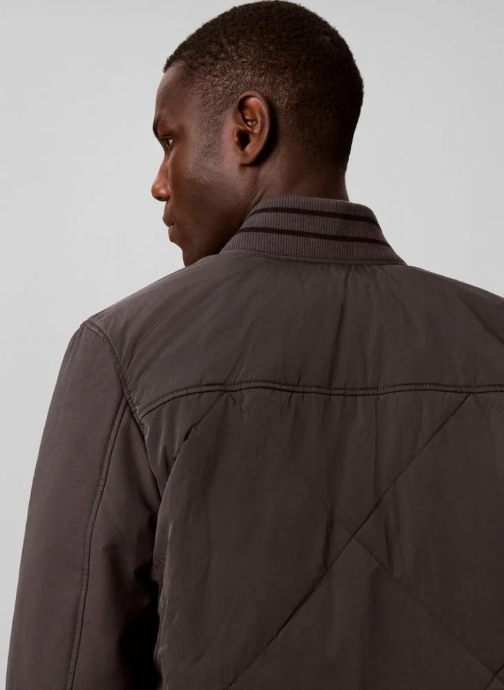 Calvin Klein Jeans  Material Mix Varsity Bomber Jacket for Men | Best Price UAE