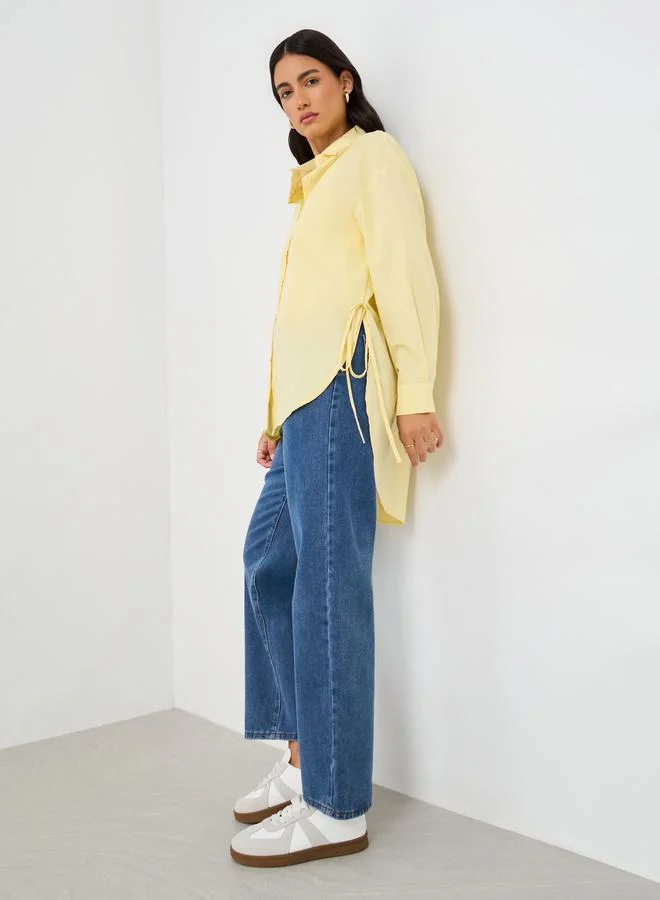 ستايلي قميص طويل بفتحات جانبية بتصميم فضفاض