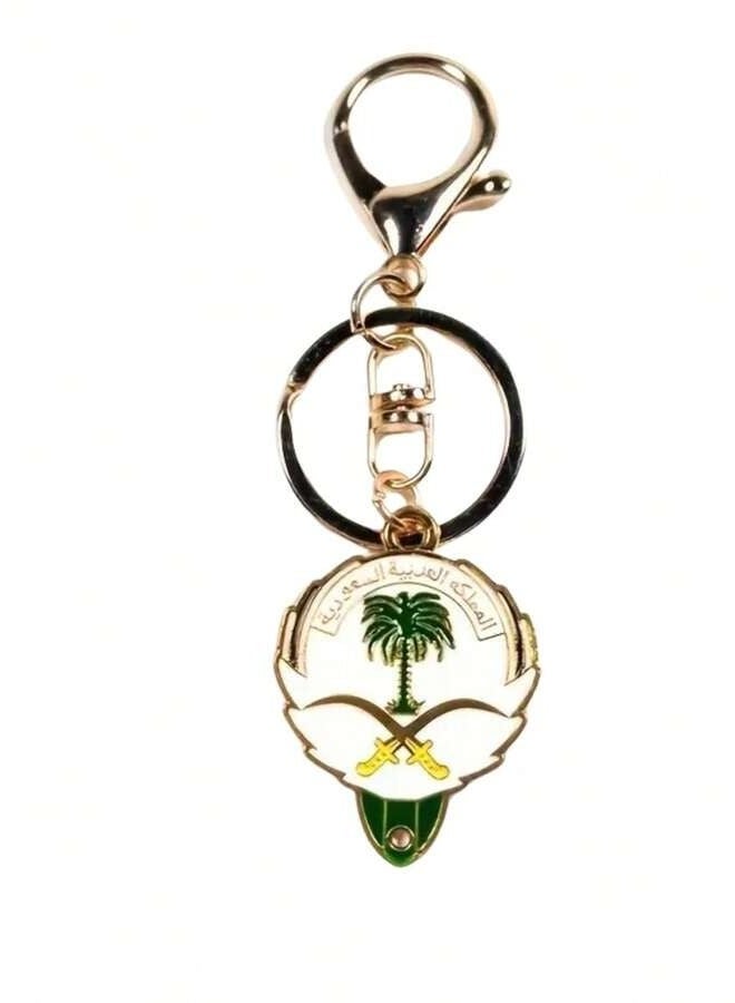 Keychain with the design of the Saudi Arabian logo in gold in an elegant green box to celebrate the National Day - Image 1