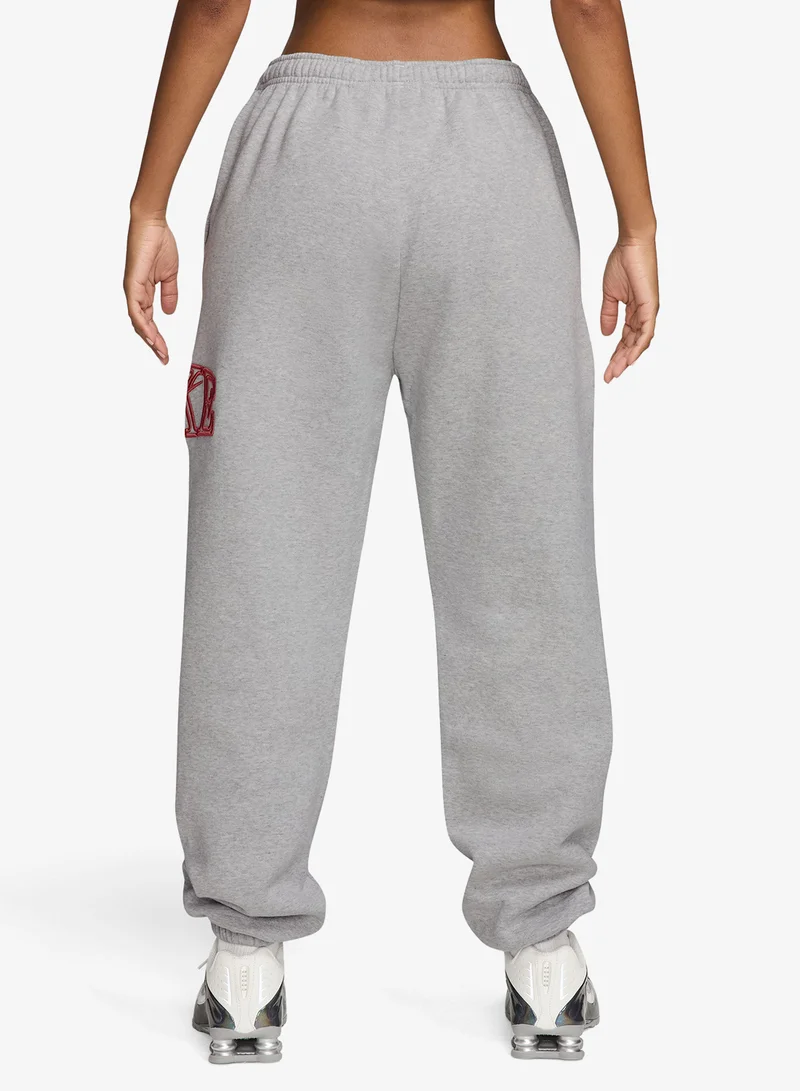 Nike WOLF GREY/HTR/(TOUGH RED) Studio Fleece Mid-Waist Logo Cuffed Sweatpants for Women | Best Price UAE