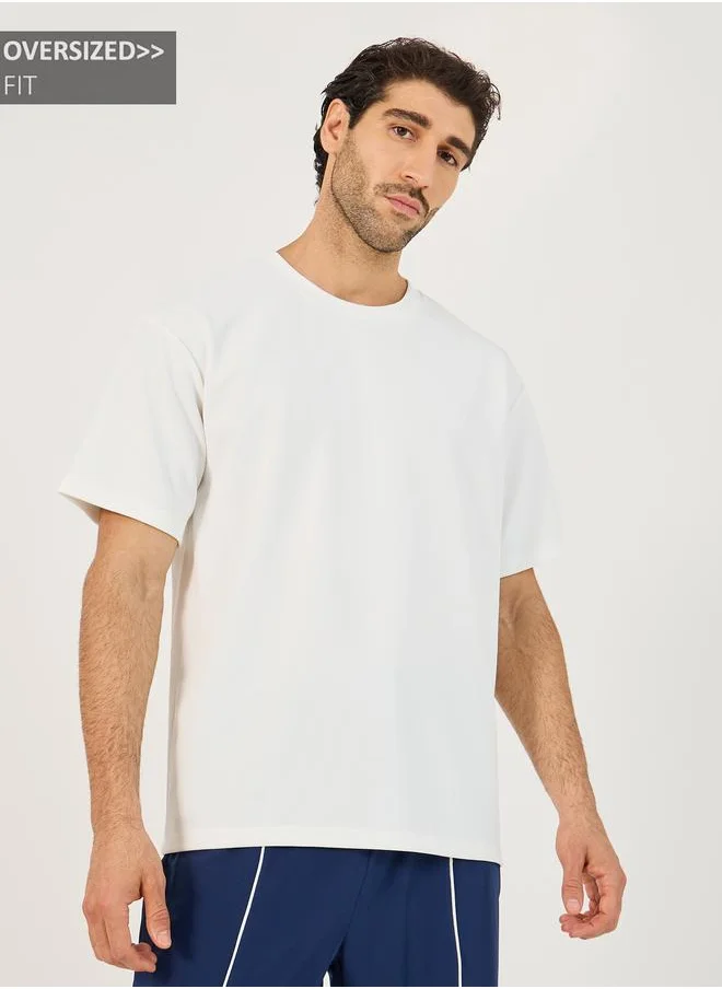 ستايلي Styli Textured Knit Oversized Training T-Shirt