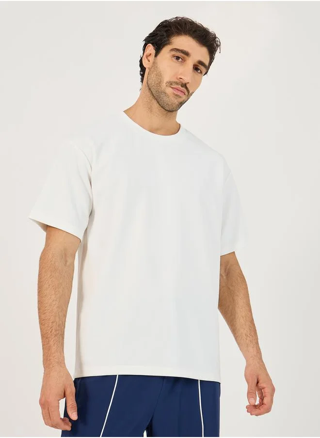 ستايلي Textured Knit Oversized Training T-Shirt