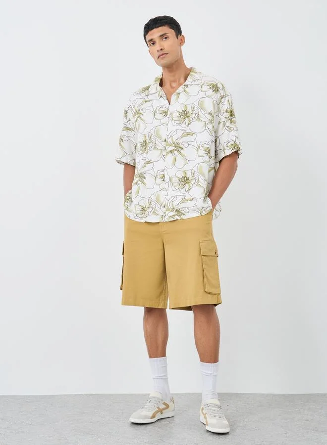 ستايلي قميص واسع بياقة منتجع وطبعة زهور شاملة