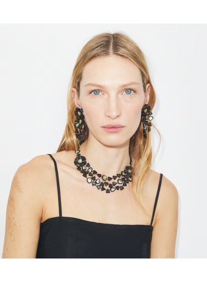 بورش قلادة راتنجية ثلاثية الخيوط بتصميم الفضول - Image 2