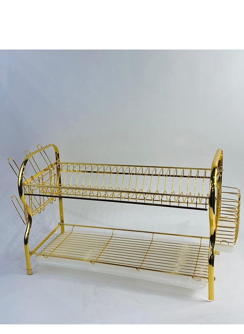 A dish rack consisting of three golden shelves, a beautiful addition.