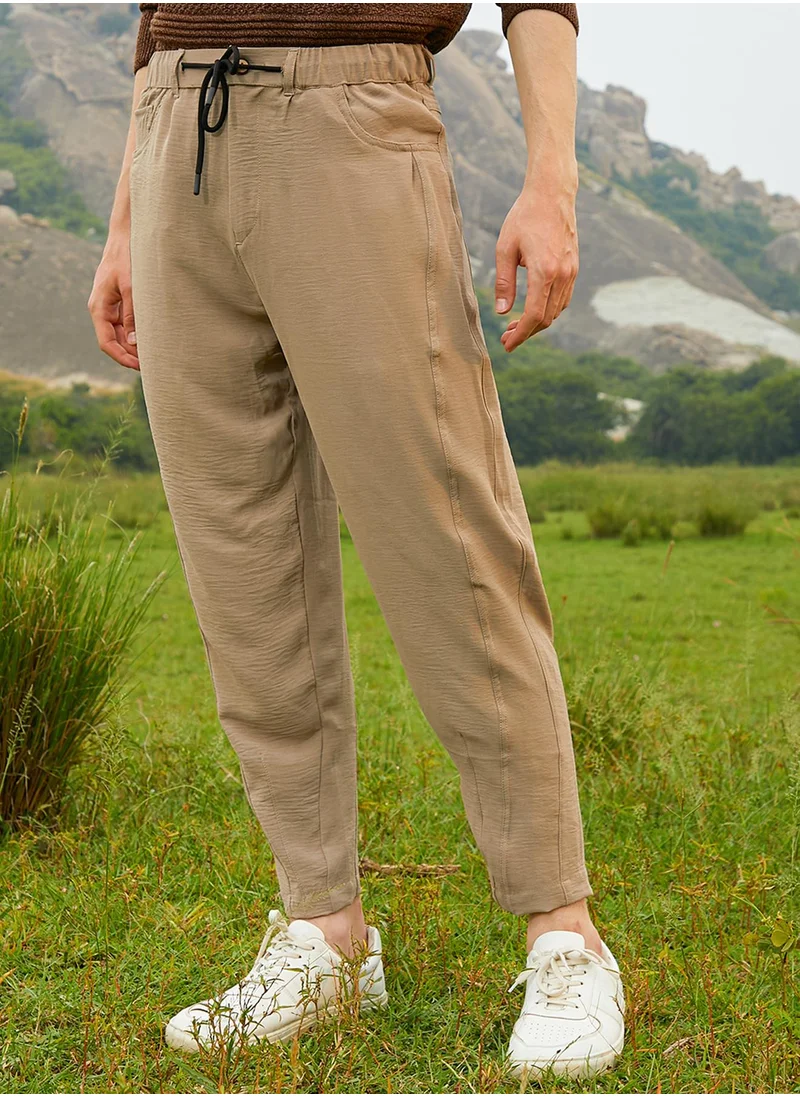 كامبوس سوترا Men's Khaki Beige Solid Tapered Trousers