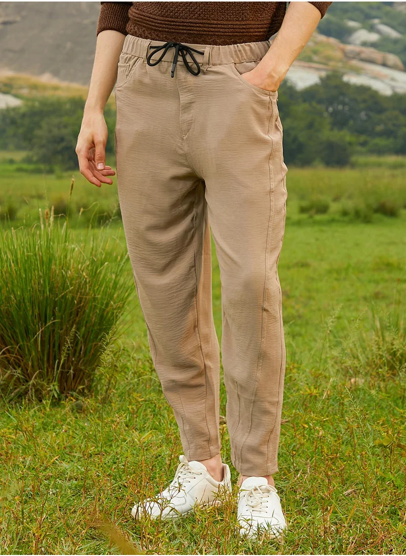 كامبوس سوترا Men's Khaki Beige Solid Tapered Trousers