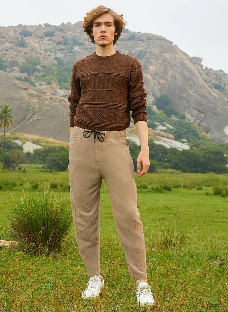كامبوس سوترا Men's Khaki Beige Solid Tapered Trousers