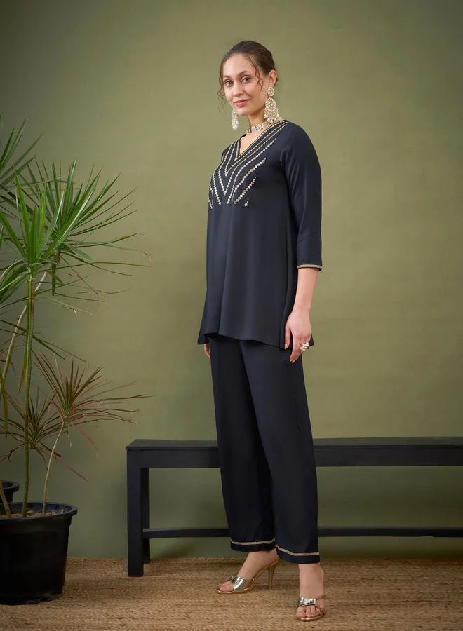 SASSAFRAS Embroidered V Neck A-Line Top & Wide Leg Pants Co-Ord by Styli