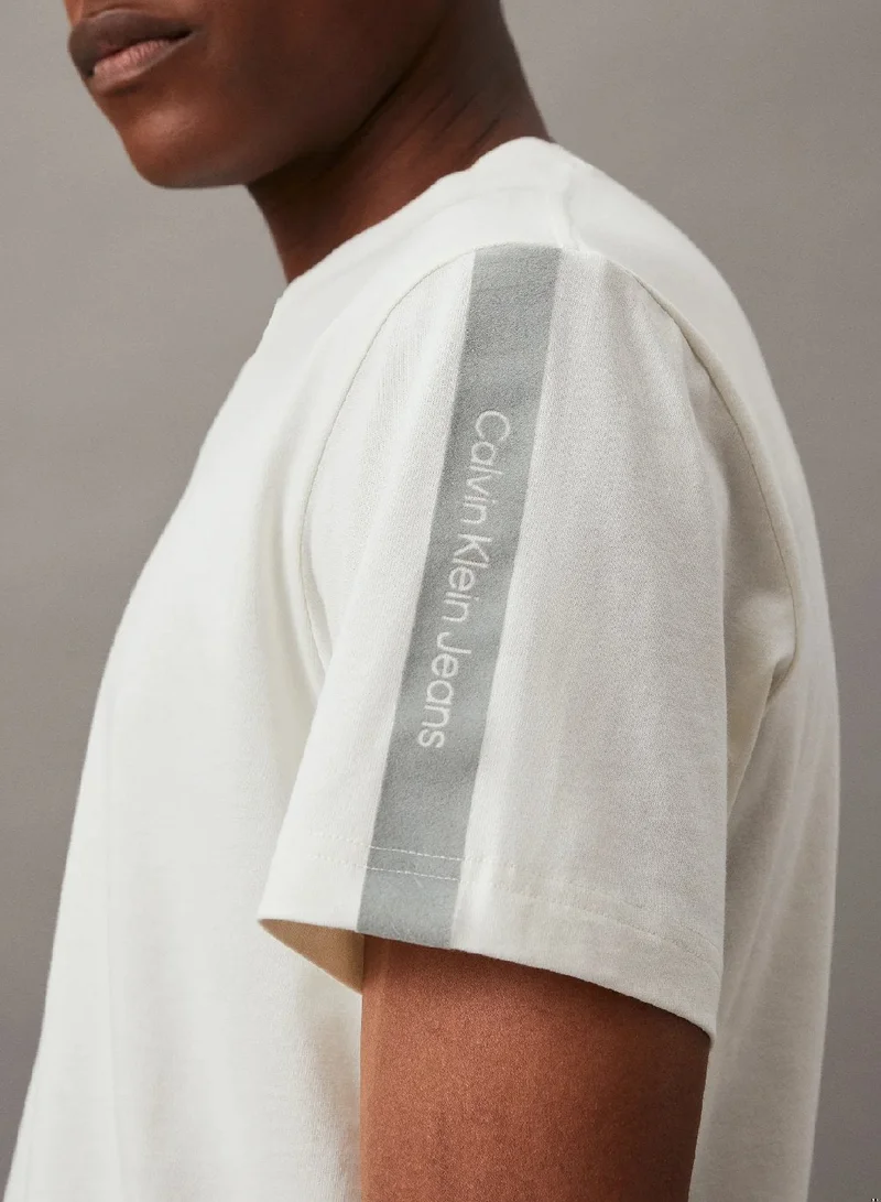 Calvin Klein Jeans Ivory Logo Tape T-shirt for Men | Best Price UAE