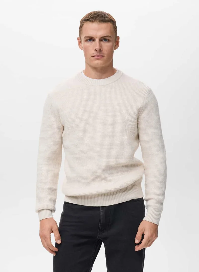 Structured knitted sweater