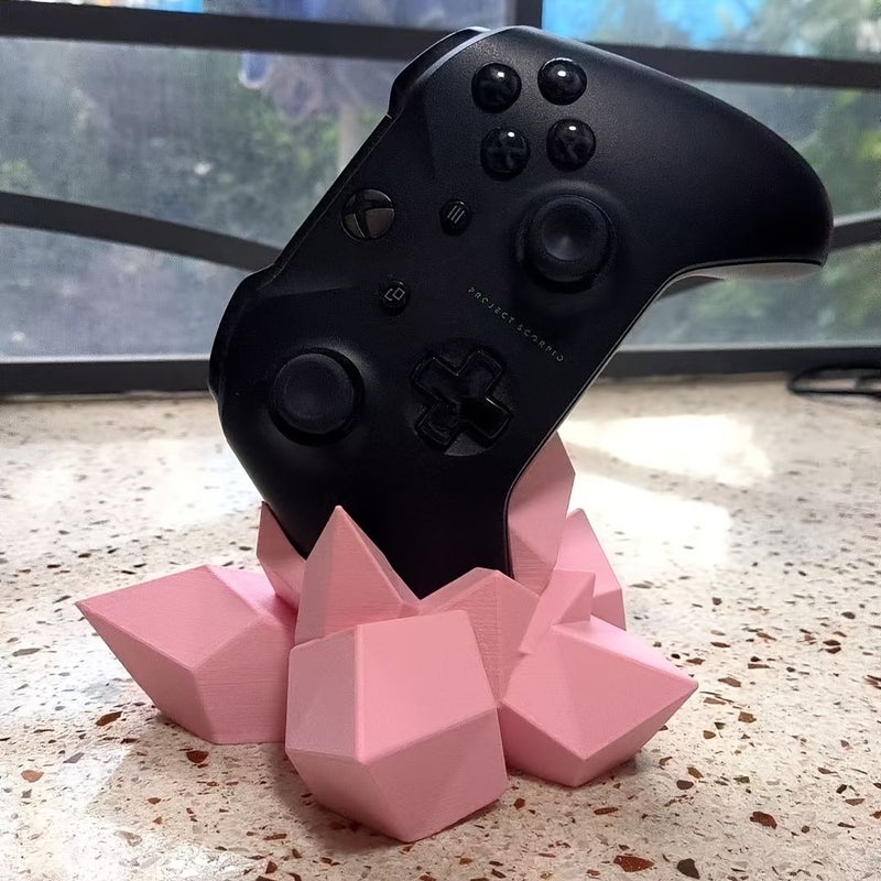 حامل أخضر عسكري لوحدات تحكم Xbox يعرض صخوراً لأجهزة Xbox وPS - Image 4