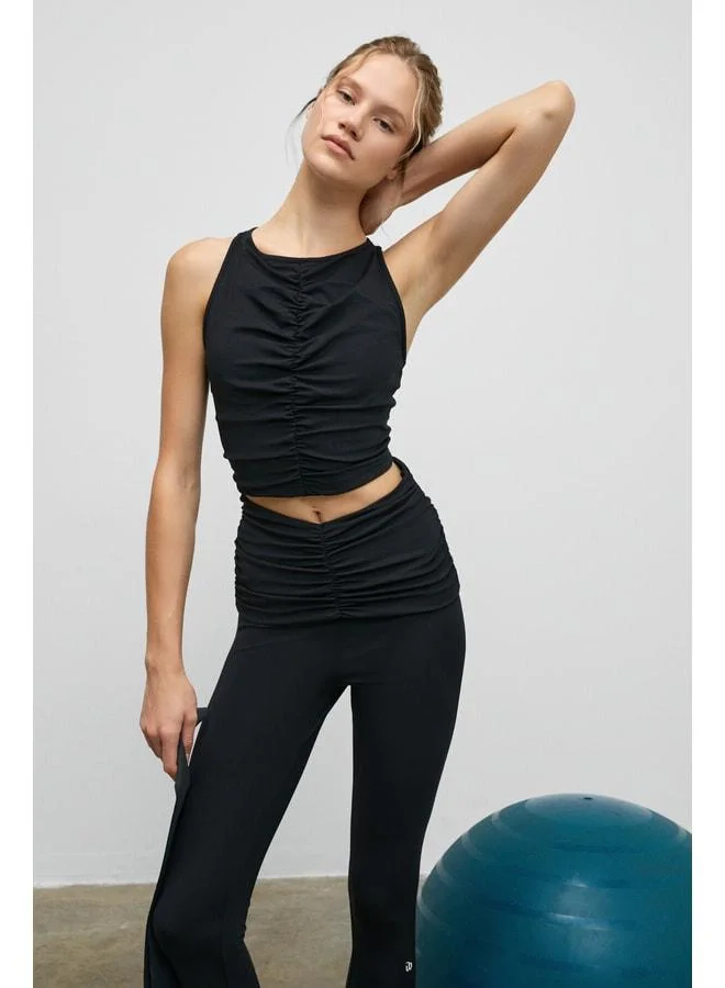 Urban Beat  MOVEXA Women’s Elastic and Soft Textured Round Neck Bustier with Front Shirring and Halter Back in Black. for Women | Best Price UAE