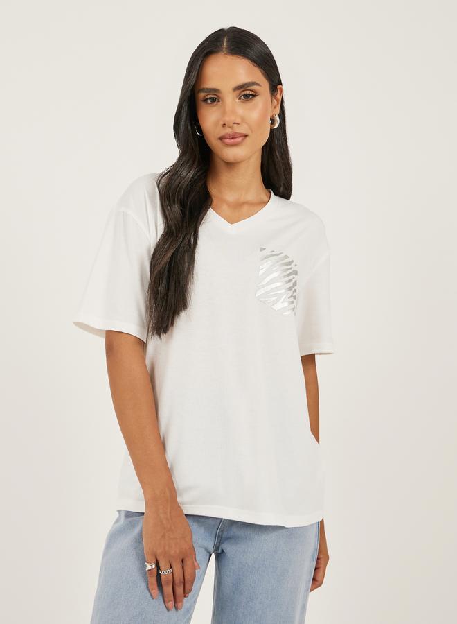 Styli Women White Oversized Zebra Foil Print Mock Pocket T-Shirt - Image 1