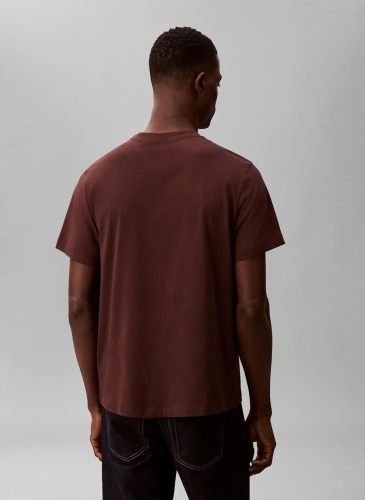 كالفن كلاين جينز تيشيرت قصير الأكمام برسومات