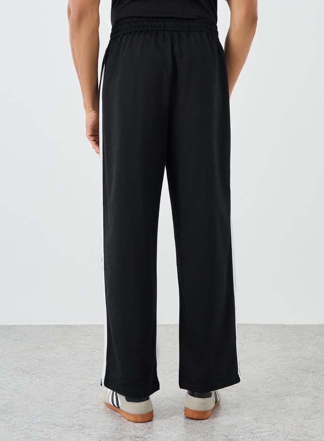 Styli Woven Relaxed Fit Joggers with Double Side Piping - Image 4