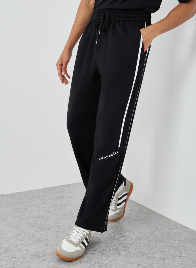 Styli Woven Relaxed Fit Joggers with Double Side Piping - Image 1