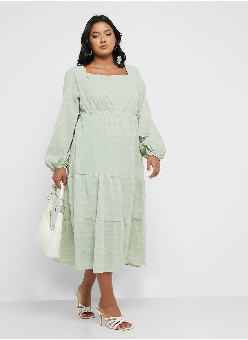 Puff Sleeved Tiered Dress - pzsku/Z92F17E729F8DE82C1075Z/45/_/1733296603/7de0e6bf-3986-48c7-bdb4-77f023532f02