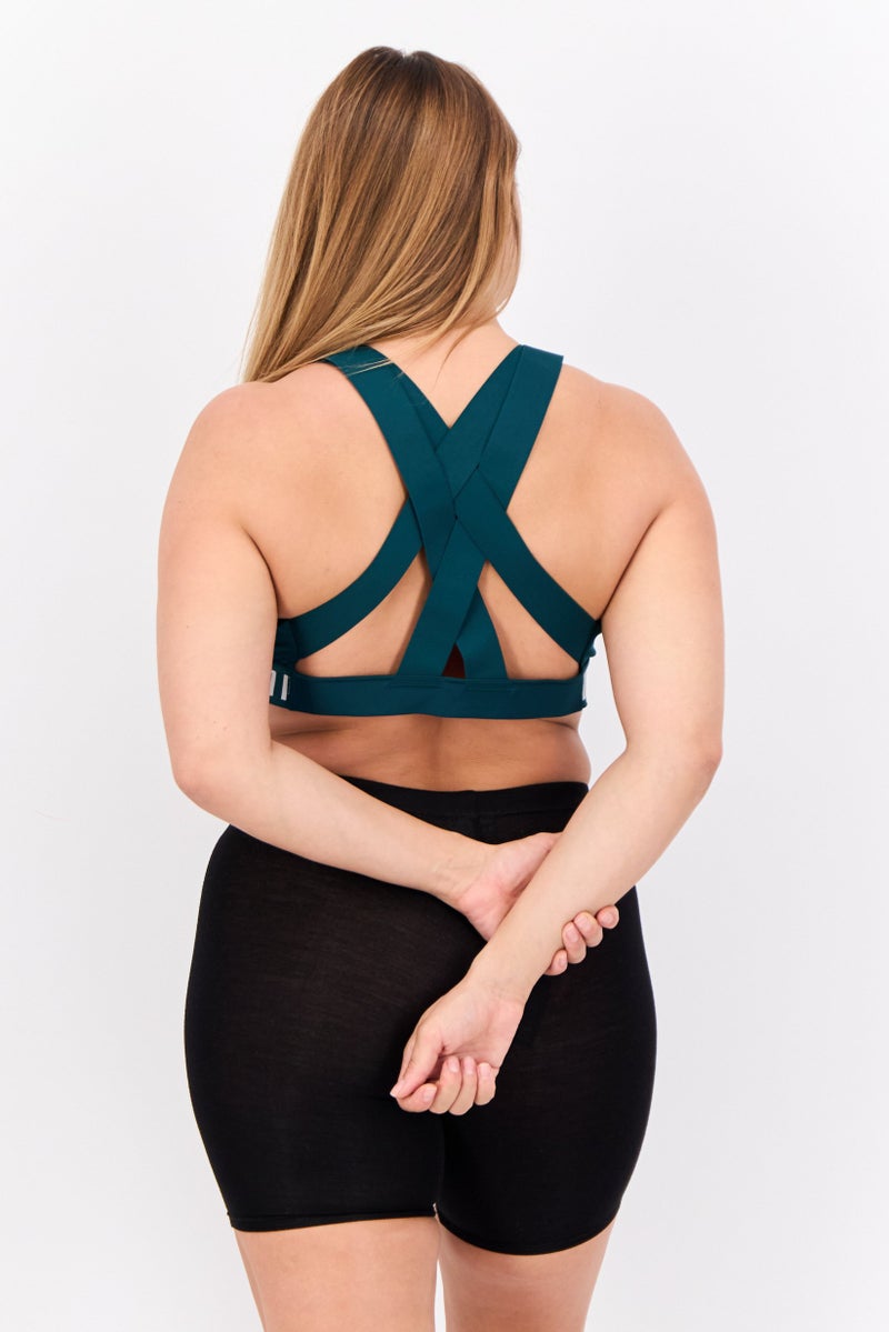 PUMA Women Brand Logo Padded Training Sports Bra, Teal Green/White - Image 3