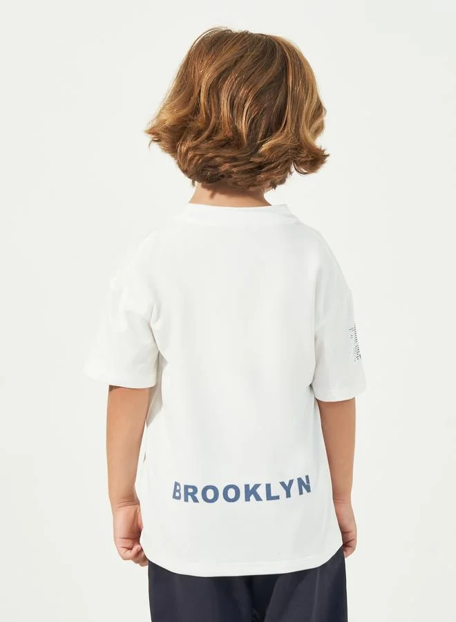 Styli Slogan Print Short Sleeves Oversized T-Shirt