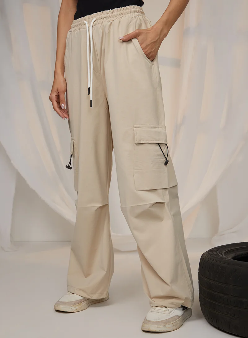 Women's Beige Solid Cargo Parachute Trousers
