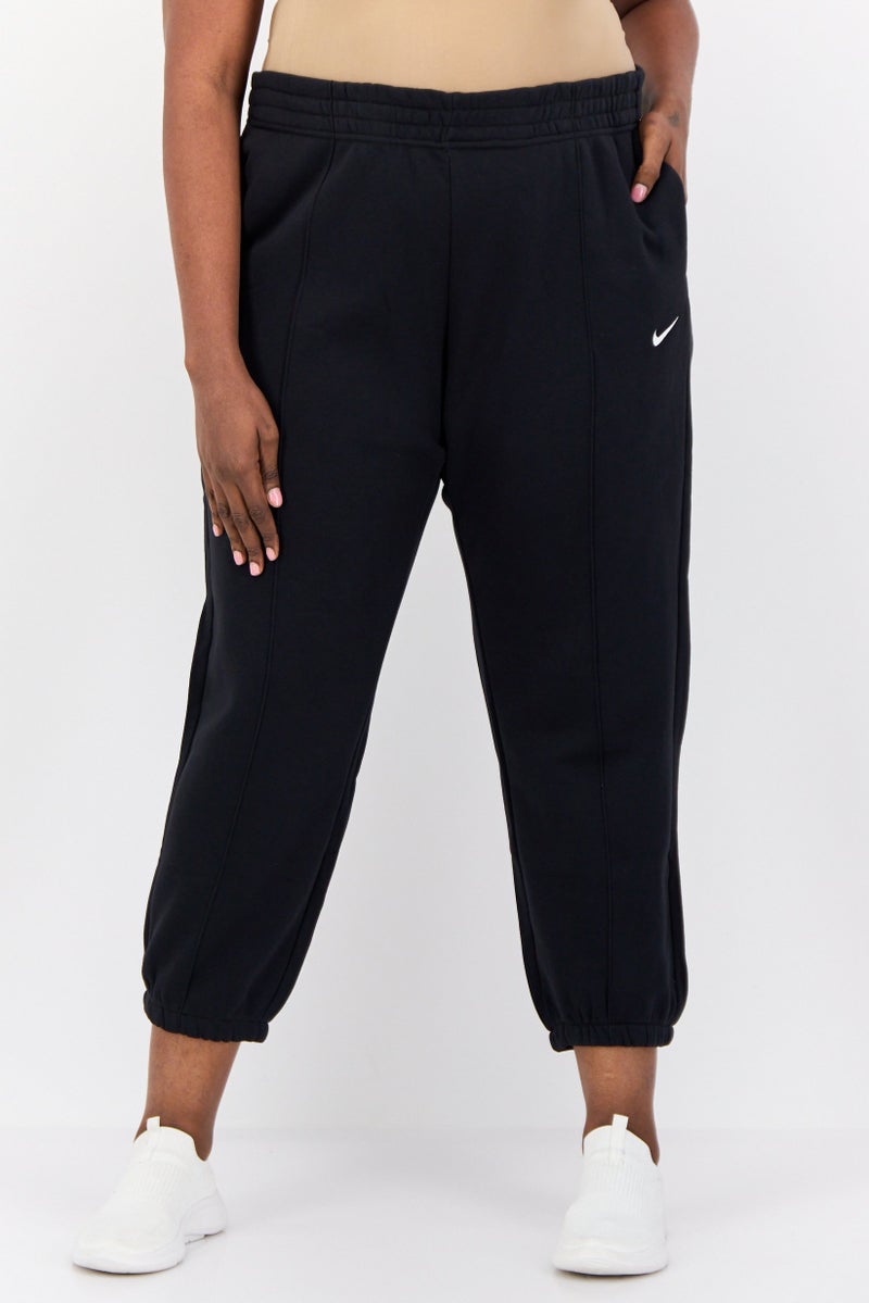 Nike سروال رياضي خارجي للنساء بحجم كبير، أسود - Image 1