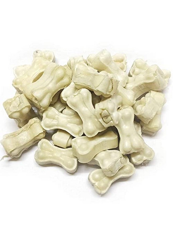 عظمة مضغ للكلاب مصنوعة من جلد خام (30 قطعة، 2 بوصة) - Image 1