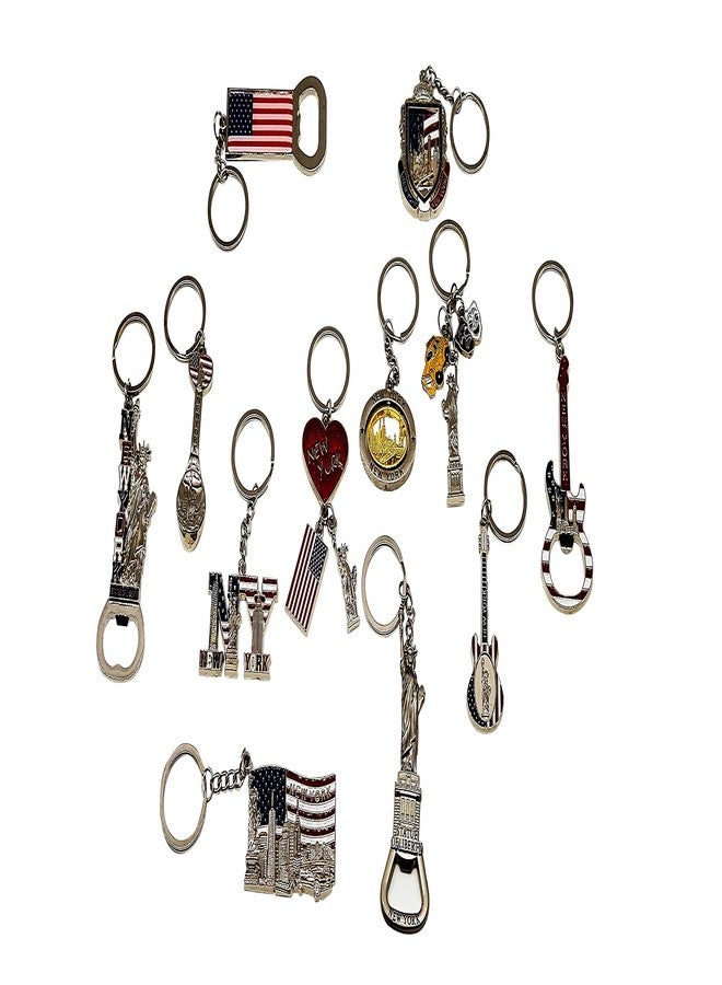 سبارك مجموعة تذكارية فضية من نيويورك (12 قطعة) تتضمن 5 قطع من فتاحات الزجاجات، وشعار مبنى إمباير ستيت، وبرج الحرية، وتمثال الحرية، وعلم الولايات المتحدة الأمريكية، وسيارة أجرة نيويورك، وتفاحة آبل، وغيرها. - Image 1