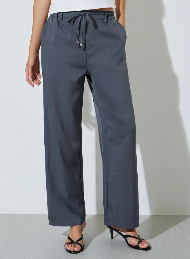 ستايلي Grey Solid Wid Leg Pants With Pocket