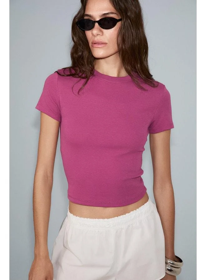 إتيكيت قميص T-Shirt للنساء من ZOLEN، بقماش ناعم ومرن، قطن عضوي، بأكمام قصيرة، قصير (Crop)، باللون الفوشيا.