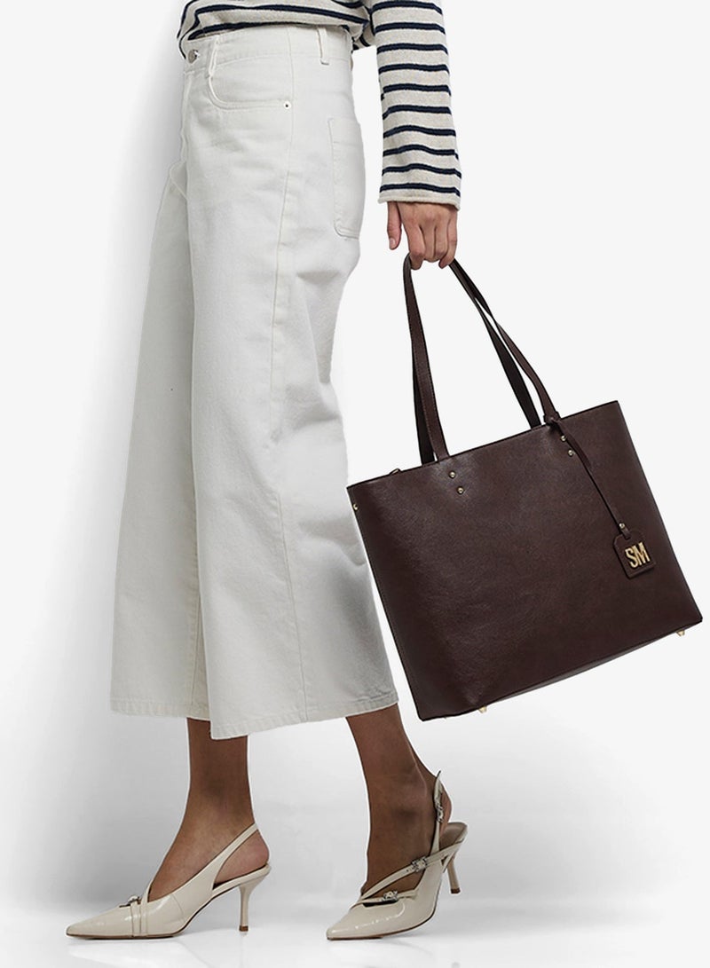 STEVE MADDEN Textured Front Pocket Shoulder Bag - Image 1
