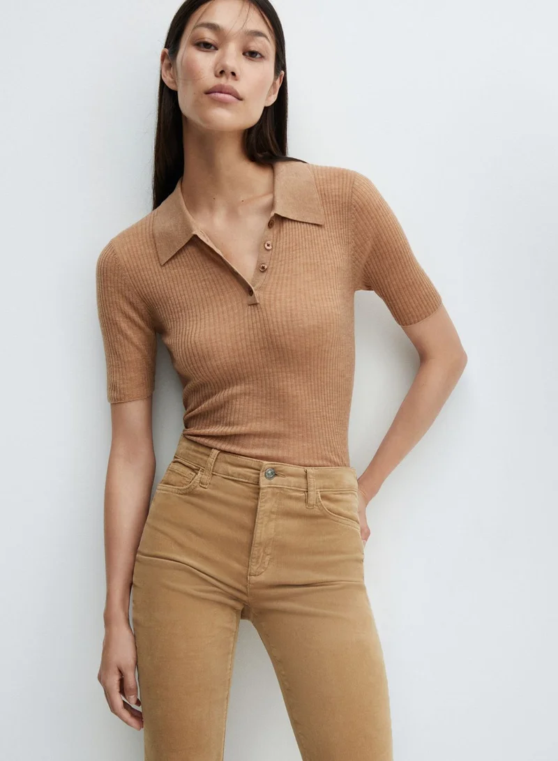 مانجو جينز بخصر عالي وحواف واسعة