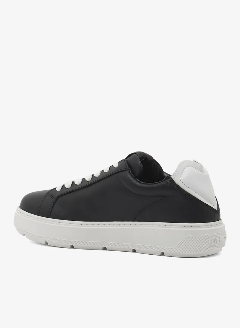 لوف موسكينو حذاء رياضي منخفض بشعار