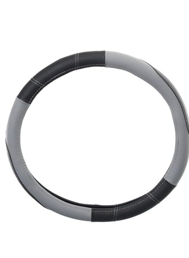 غطاء طارة دركسيون من الجلد - اسود/رمادي - Image 1