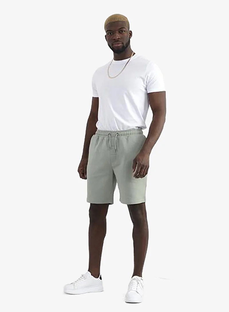 BRAVE SOUL MENS SHORTS WITH DRAWCORD AND METAL EYELET & AGLET. SIDE ENTRY POCKETS - BACK RHS AS WORN POCKET-ELASTICATED WAIST BAND.