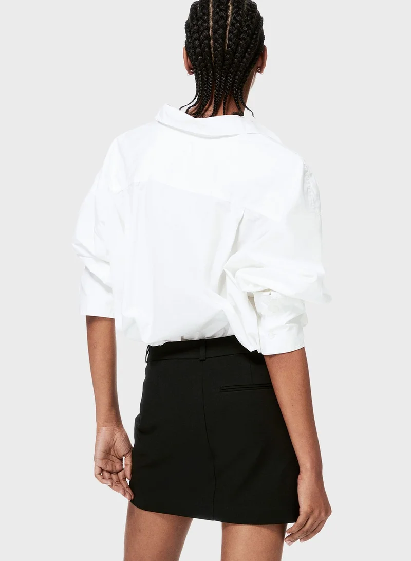 اتش اند ام تنورة قصيرة عالية الخصر