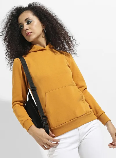 Campus Sutra Women's Mustard Yellow Pullover Hoodie With Kangaroo Pocket For Casual Wear | Hood Neck  | Long Sleeve | Drawstring Closure | Cotton Sweatshirt Crafted With Comfort Fit For Everyday Wear | Yellow