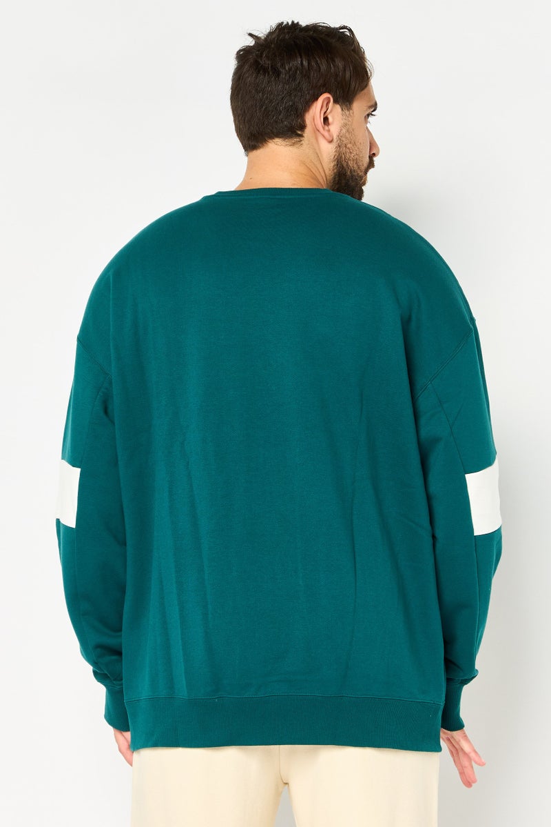 PUMA سويت شيرت رياضي للرجال بأكمام طويلة مناسب في الهواء الطلق، أخضر - Image 3