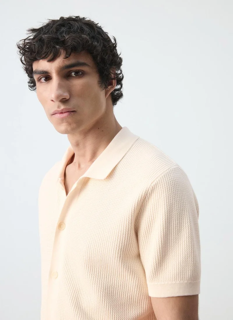 Mango Man  100% cotton structured knit polo with buttons for Men | Best Price UAE