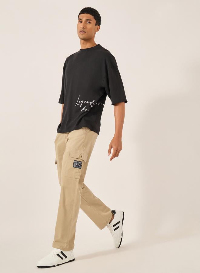 Styli Relaxed Fit Cargo Pants with Badge Detail  - Image 1