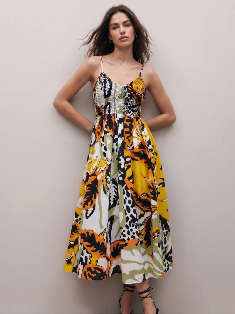 Multi Printed A-Line Silhouette With A Diamond Smocked Upper Bodice And Flowy Skirt