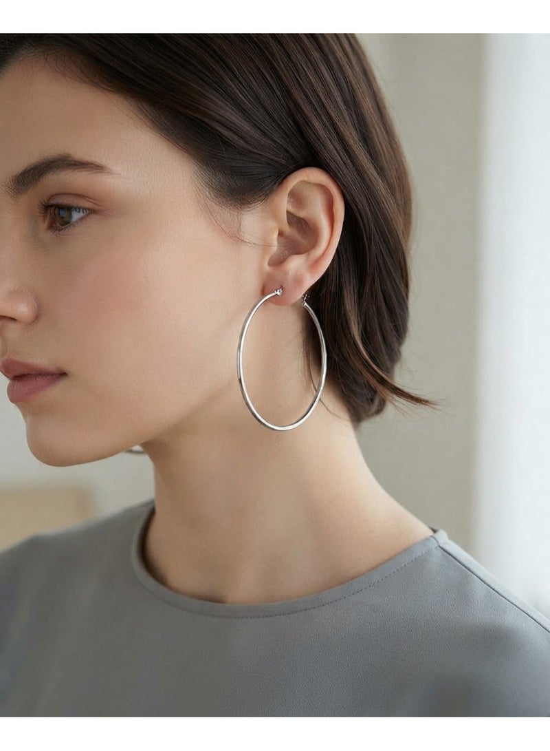Luxuria Women's silver-tone hoop earrings, 50mm diameter, made of silver-tone stainless steel. - Image 2