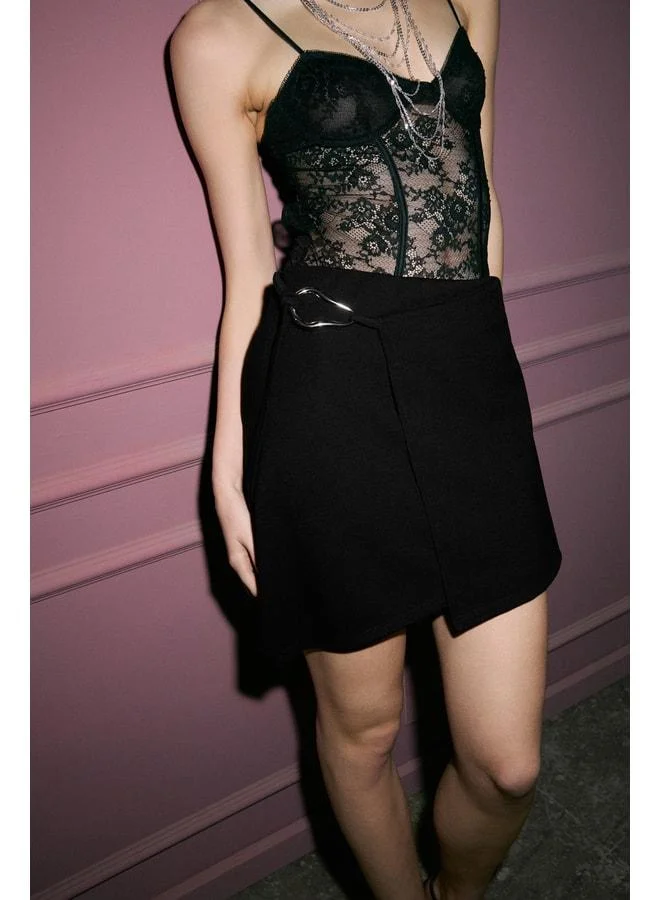 GRIMELANGE UKELE Women's Flexible Fabric Side-Opening and Button-Detail Mini Black Skirt.