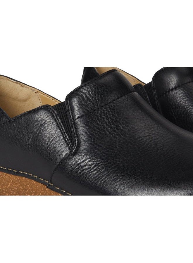 Dansko Meara Slip-On Shoe for Women - Dual-Density Cork/EVA Midsole and Lightweight Rubber Outsole Provide Durable and Comfortable Ride on Patented Stapled Construction Black 7.5-8 M US - Image 2