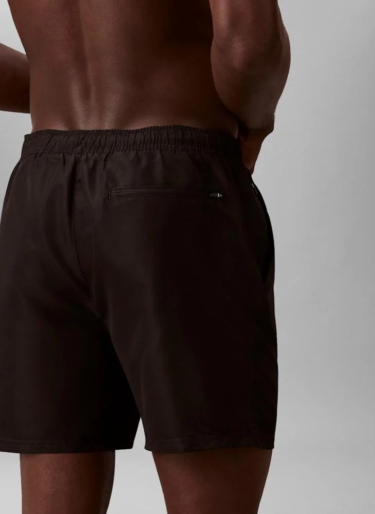 CALVIN KLEIN  Medium Drawstring Swim Shorts for Men | Best Price UAE