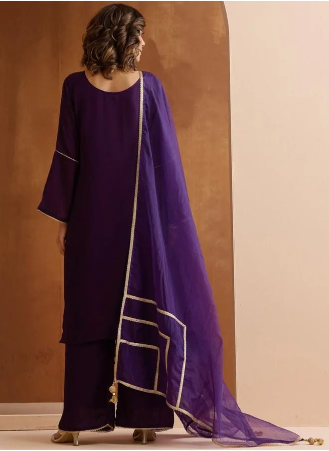 ISHIN Palazzo Women Purple Rayon Kurta Set with Embroidered pattern Tunic and Palazzo features a Round neckline and Three-Fourth Sleeve secured with Elastic closure and styled in Straight Fit ideal for Festive moments — a must-have for your statement wardrobe.