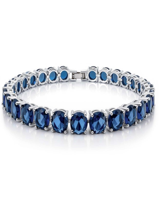 KEZEF 7mm Simulated Sapphire CZ Tennis Bracelet for Women – 7" Silver-Plated Brass, Blue Cubic Zirconia, Fold-Over Clasp - Image 1