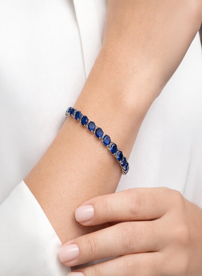 KEZEF 7mm Simulated Sapphire CZ Tennis Bracelet for Women – 7" Silver-Plated Brass, Blue Cubic Zirconia, Fold-Over Clasp - Image 2