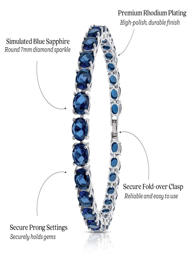KEZEF 7mm Simulated Sapphire CZ Tennis Bracelet for Women – 7" Silver-Plated Brass, Blue Cubic Zirconia, Fold-Over Clasp - Image 4