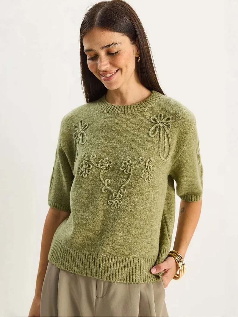 بيانكو لوتشي كنزة محبوكة بياقة دائرية مطرزة من لوتشي